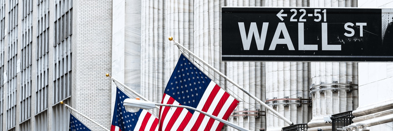 Wall St. Street Sign with American Flags