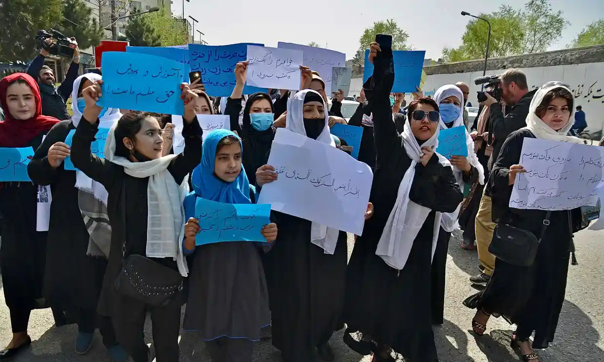 women and young girls took in demonstration over the decision taken by de facto authorities.
